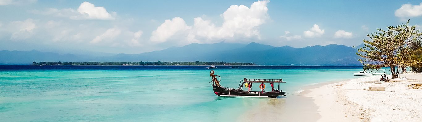 A,Boat,Parked,Next,To,The,Shore,On,Gili,Air,